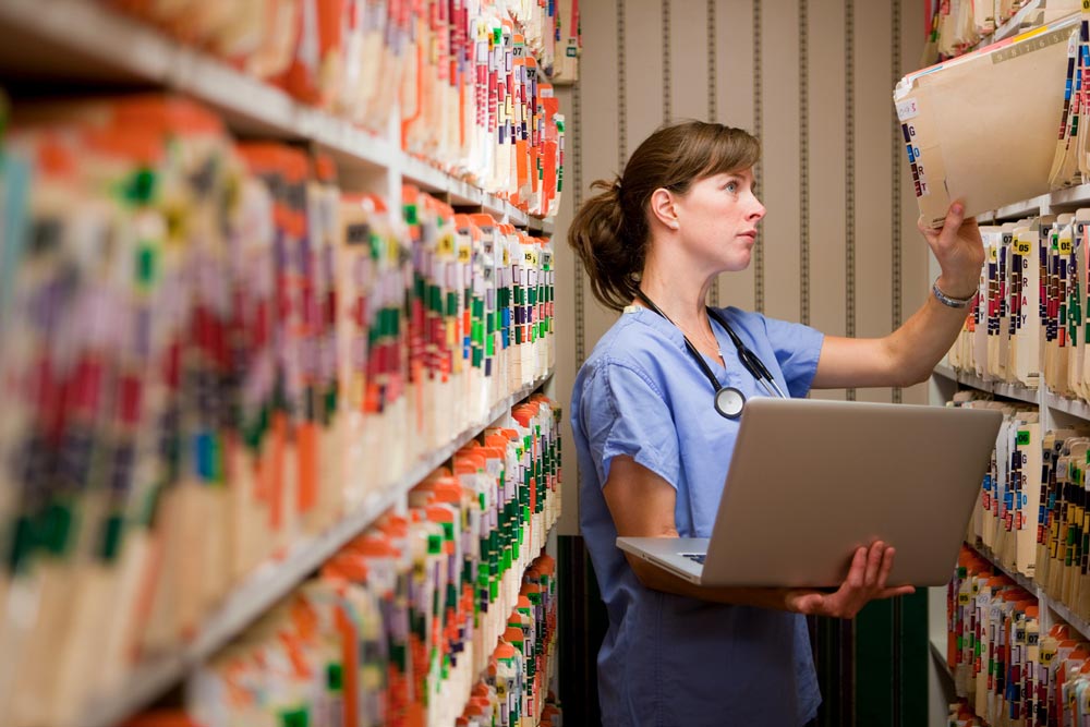 Nurse with patient files
