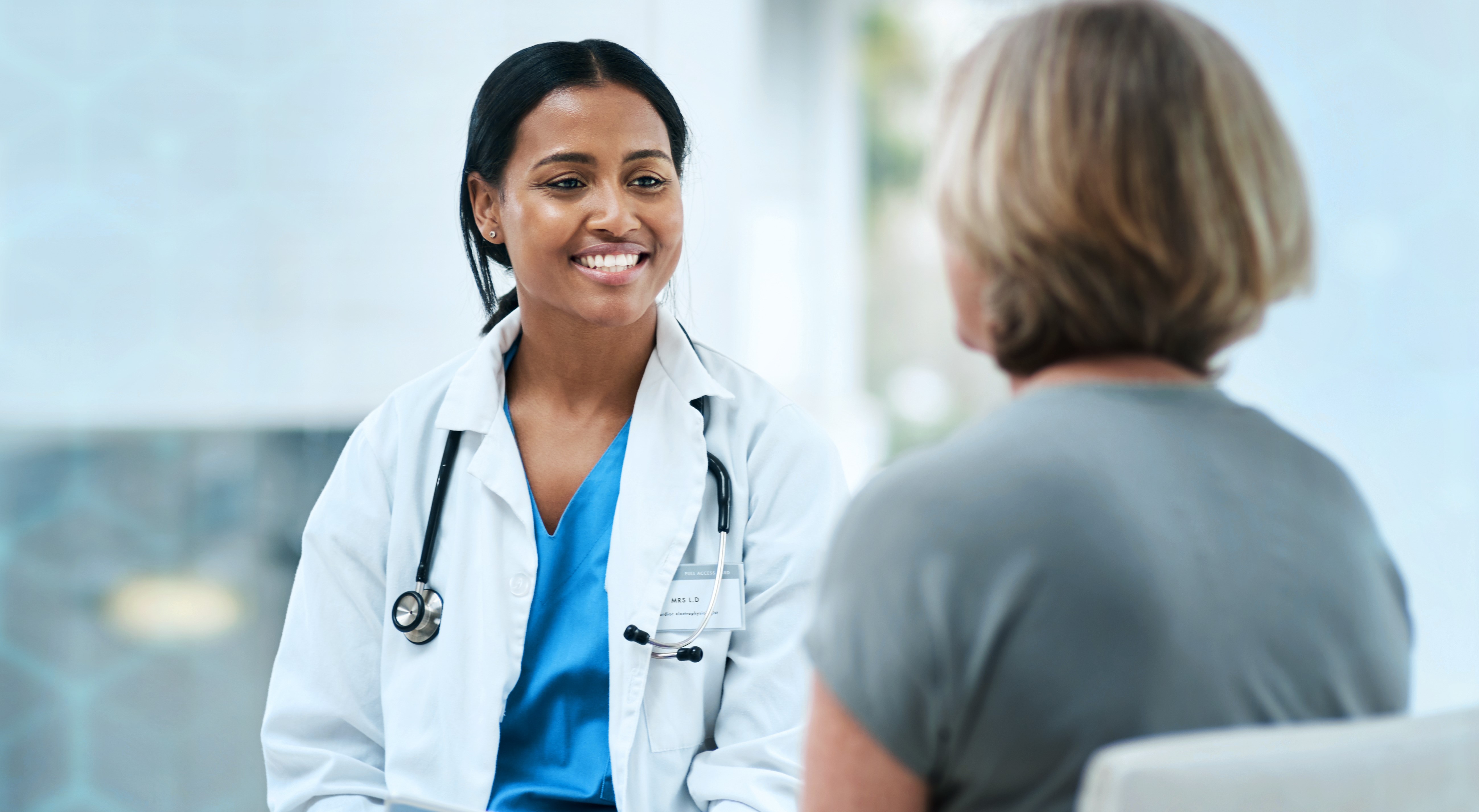 doctor talking to patient