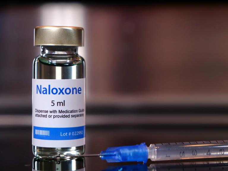 Vial of naloxone with syringe