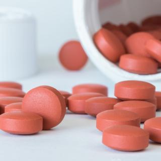 Ibuprofen Tablets Spilled from the Bottle