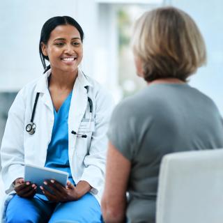 doctor talking to patient